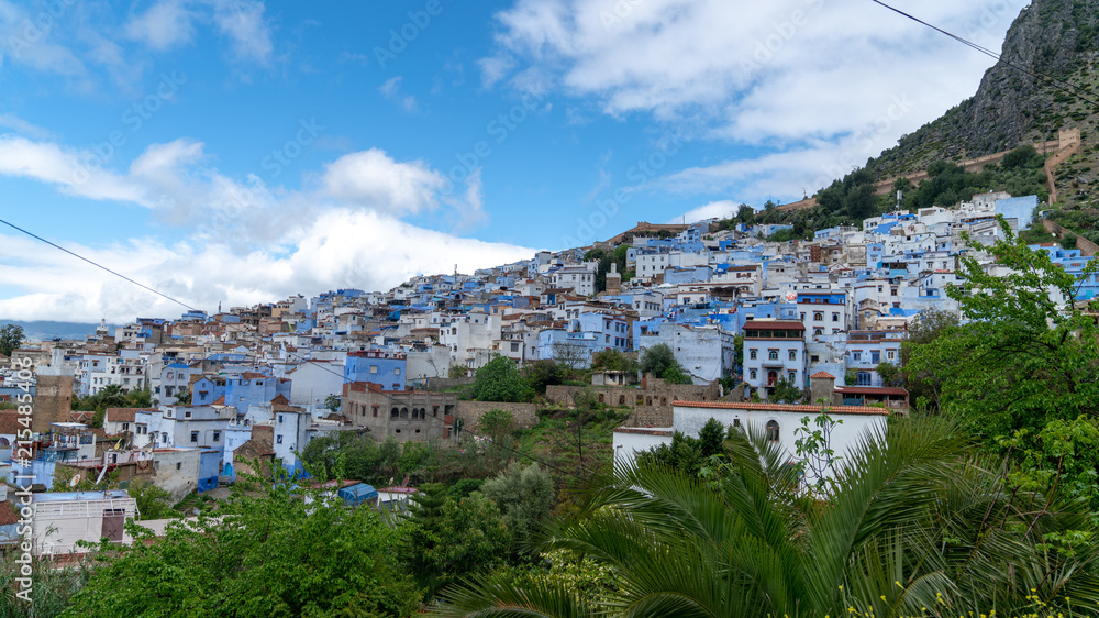 Obraz premium Chefchaouen panorama, blue city skyline on the hill, Morocco