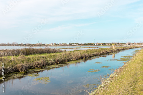 Italy, Cervia. This city is famous for its salt. Saltern date back to ancient times.