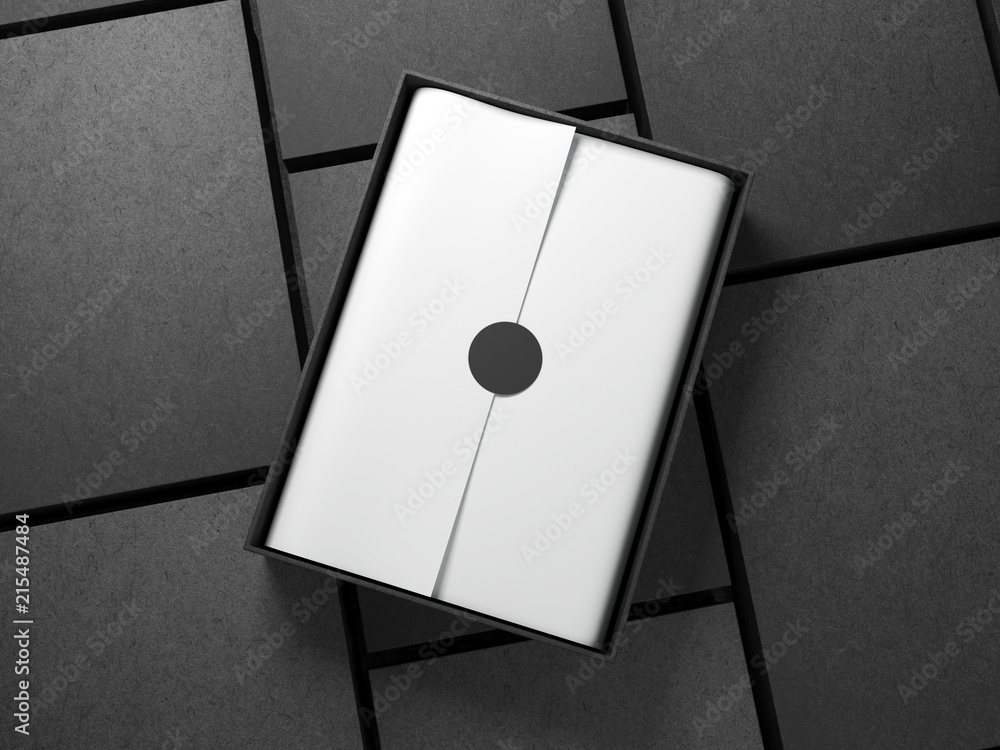 Opened black Box with white wrapping paper and circle sticker