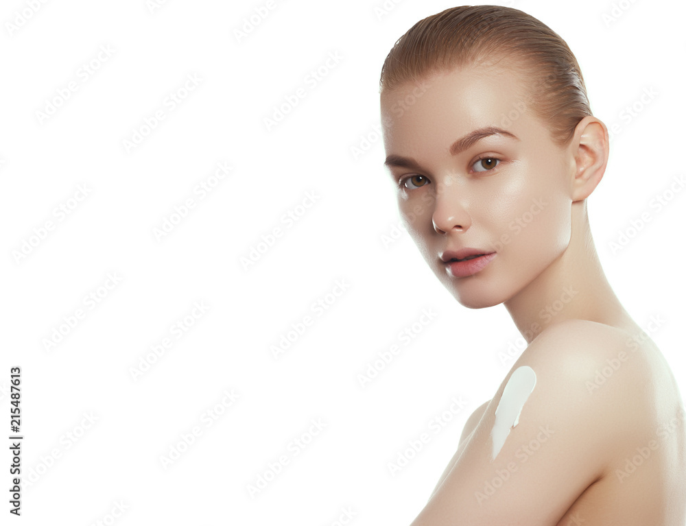 Fototapeta premium Beauty face. Beautiful Young Woman with Clean Fresh Skin touch own face and body. Facial treatment. Cosmetology, beauty and spa concept