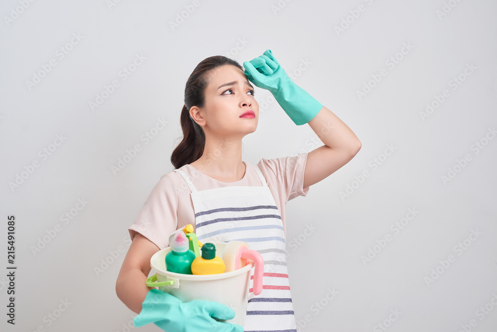 Young housewife is tired of cleaning,Exhausted housewife Young housewife is tired of cleaning,Exhausted housewife