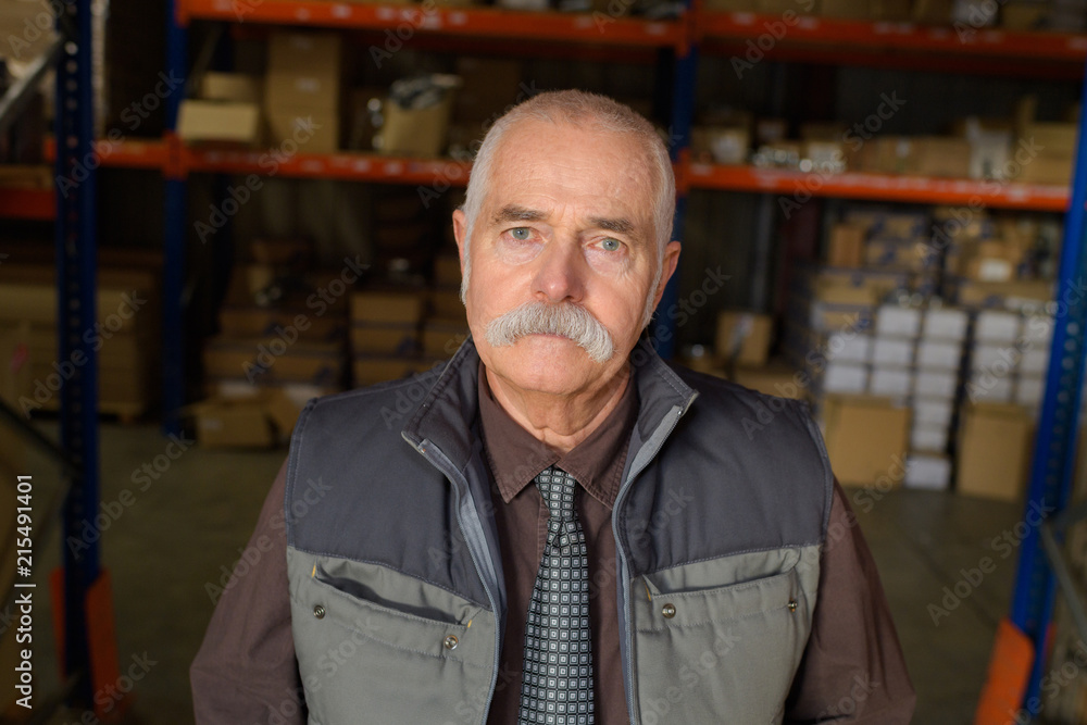 senior worker portrait in warehouse senior worker portrait in warehouse