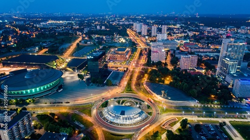 Aerial drone view on Katowice centre and roundabout at night.