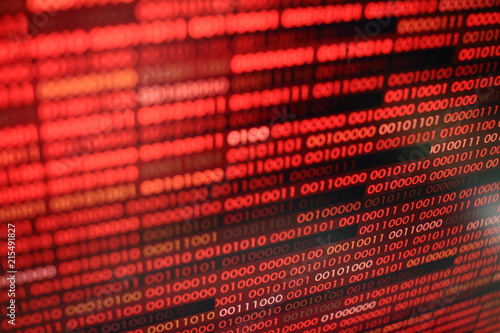 red binary code. computer technology background. red binary code computer language data transfers. unsecured and dangerous big data and ai artificial intelligence cyber network.