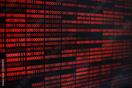 red binary code. computer technology background. red binary code computer language data transfers. unsecured and dangerous big data and ai artificial intelligence cyber network.
