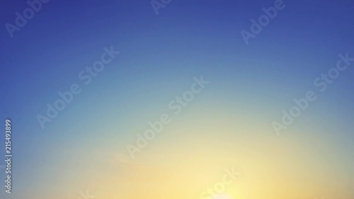 Plane flying over head, landing at airport at sunset or sunrise