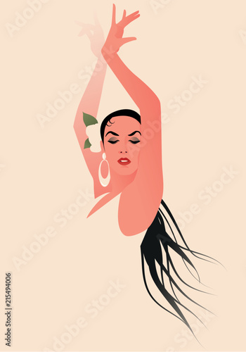 Beautiful Spanish flamenco dancer wearing flower in her hair