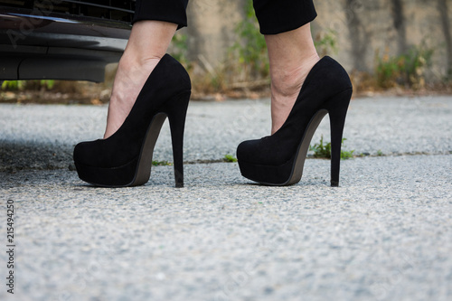 Woman legs with black high heels © funkenzauber
