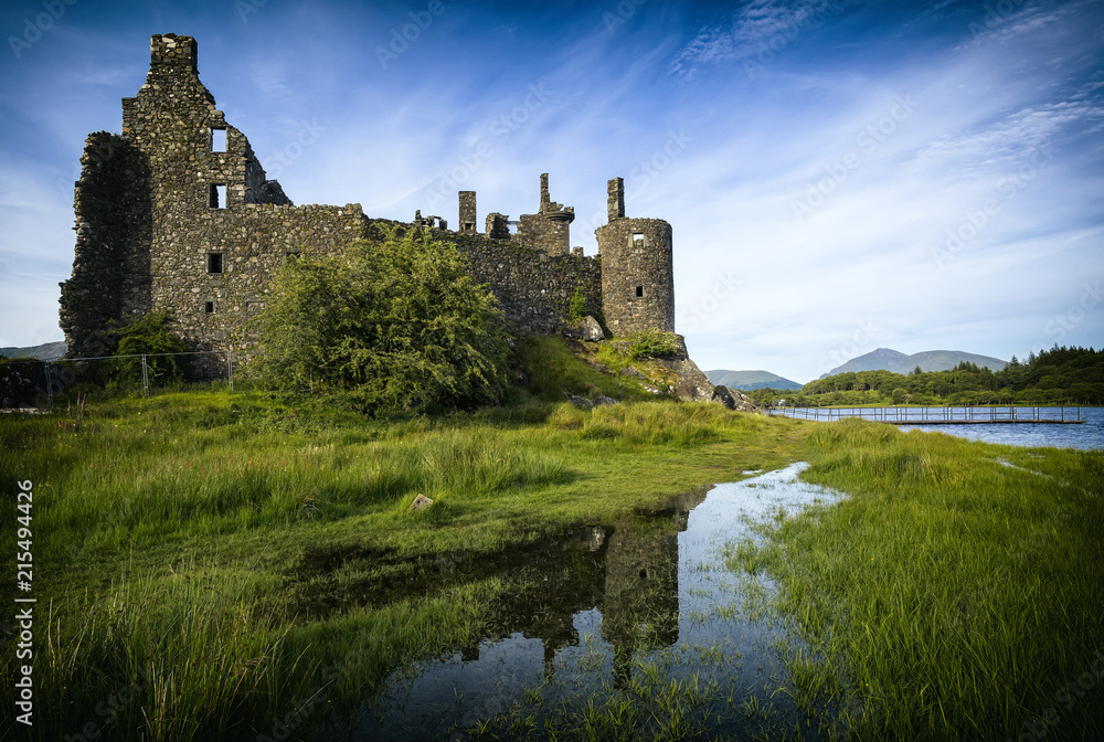 Reflection of Kilchurn Castle in Loch Awe, Highlands, Scotland, United Kingdom.