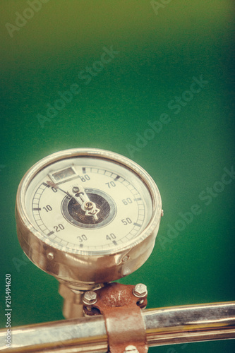 Vintage motorcycle speedometer photo