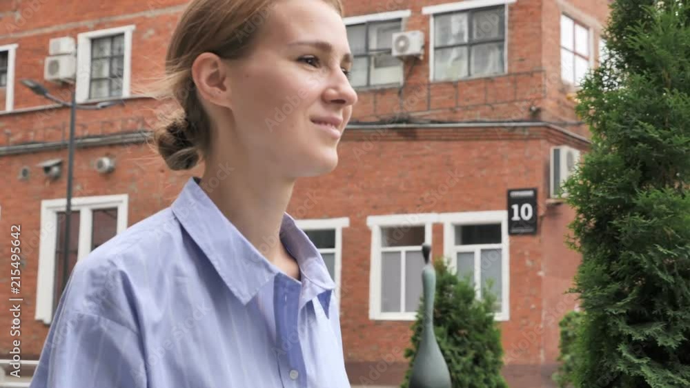 Casual Woman Walking on Street in Slow Motion Casual Woman Walking on Street in Slow Motion