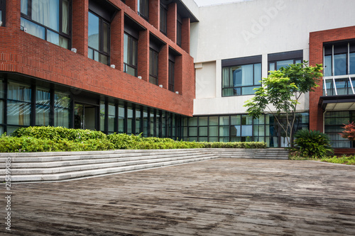 empty road with modern buildings on background photo