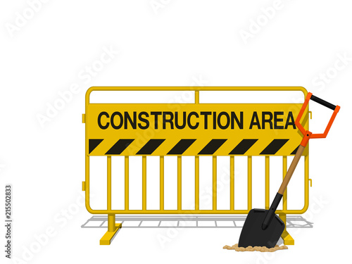 Yellow steel barrier with  shovel in the concept of under construction area