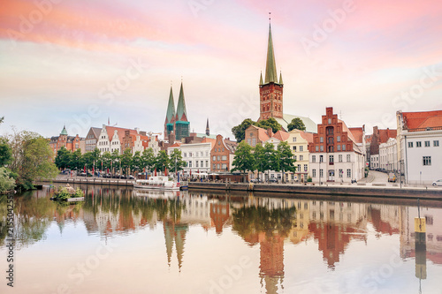 Lubeck old town reflected in Trave river, Germany