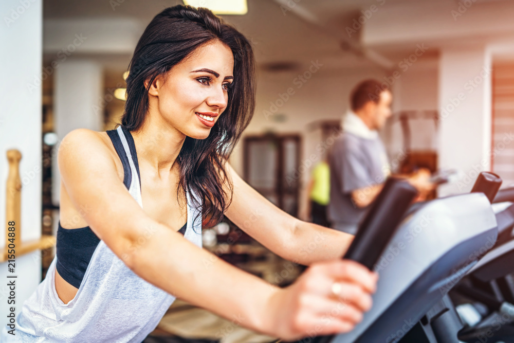 Cute sporty girl workout in the gym Cute sporty girl workout in the gym