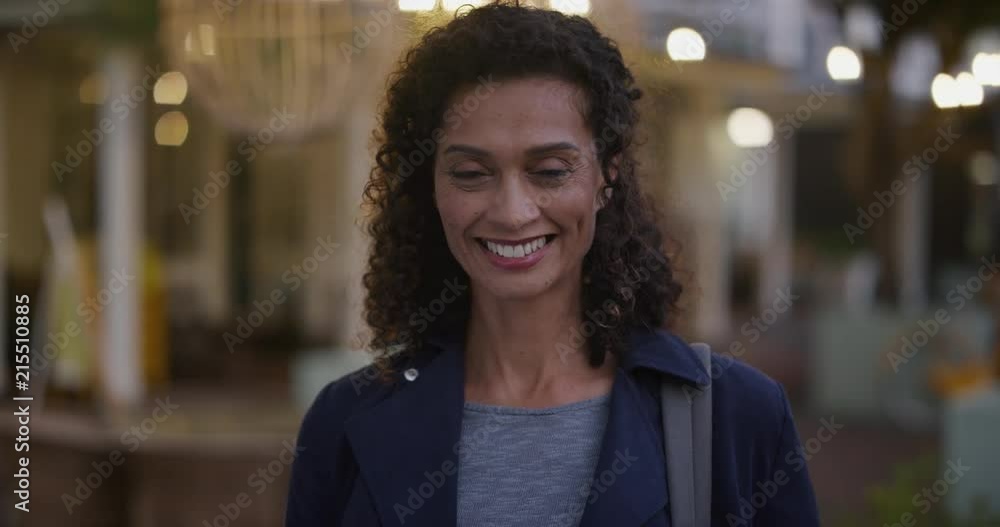 portrait beautiful mature business woman smiling happy enjoying successful urban lifestyle independent female entrepreneur in city evening slow motion portrait beautiful mature business woman smiling happy enjoying successful urban lifestyle independent female entrepreneur in city evening slow motion