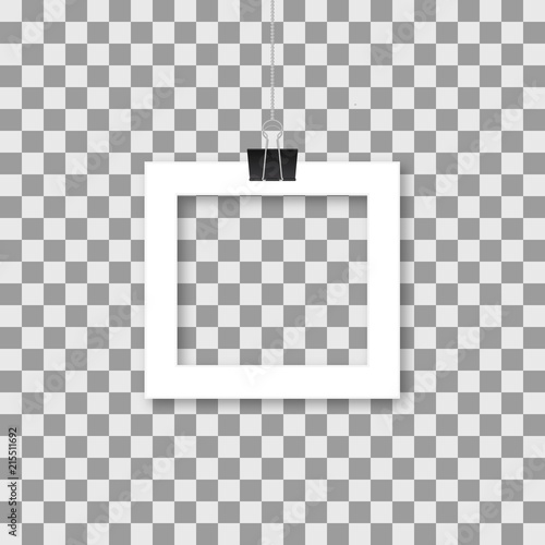 Realistic paper photo frame hanging by binder clips isolated on transparent background. Retro vintage style mockup. Vector illustration.