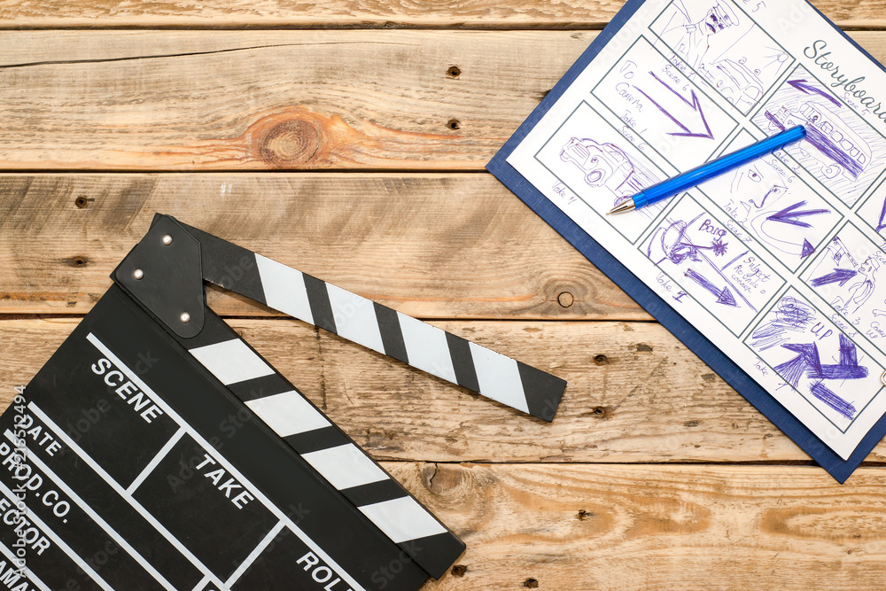 Fototapeta premium clapperboard, storyboard on wood