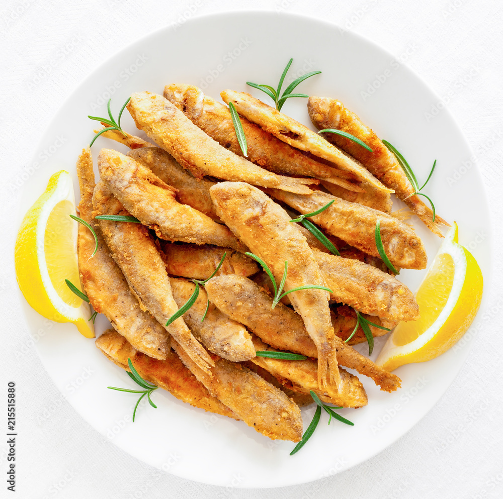 fried breaded whole surmullets with rosemary and lemon fried breaded whole surmullets with rosemary and lemon