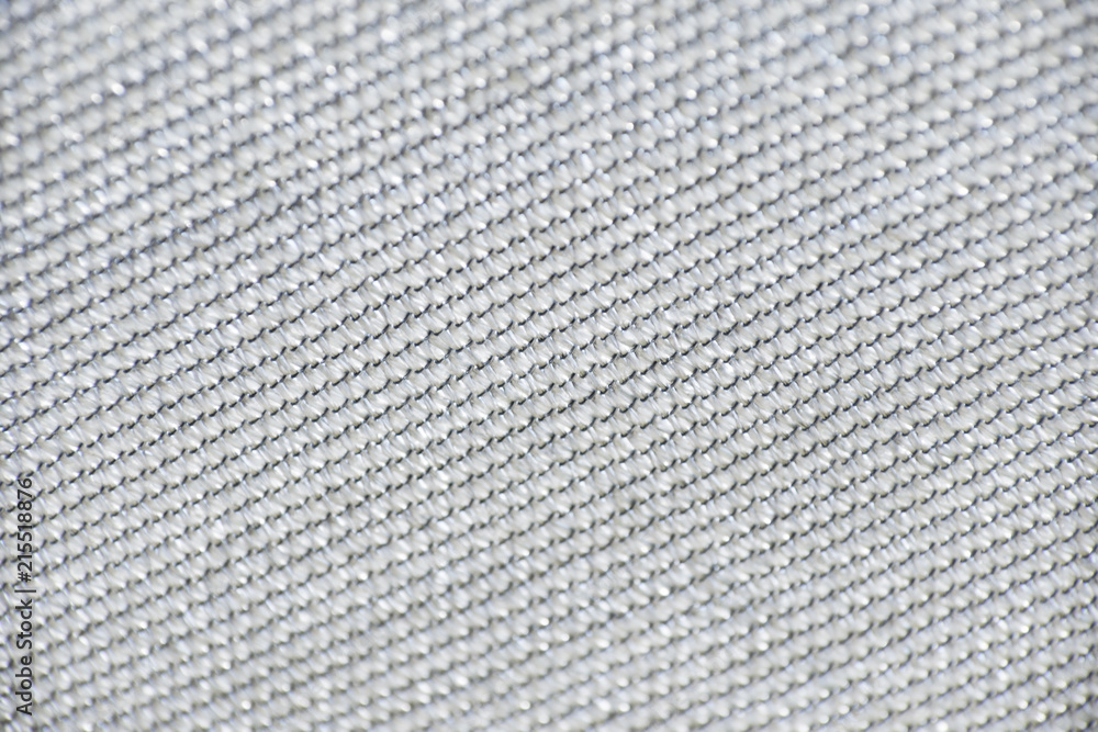 Grey fabric fiber textile detail line knot pattern texture close-up Grey fabric fiber textile detail line knot pattern texture close-up