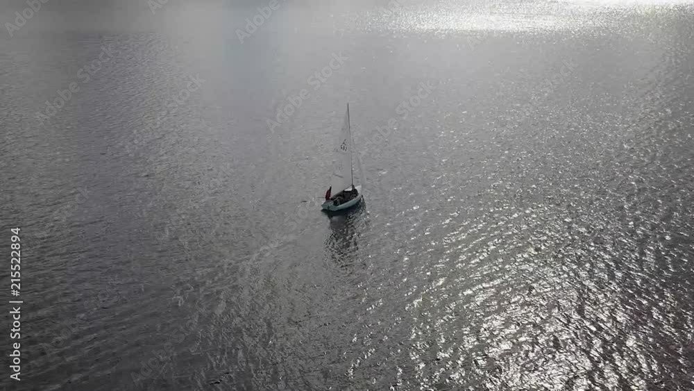 Daysailer sailboat on lake Daysailer sailboat on lake