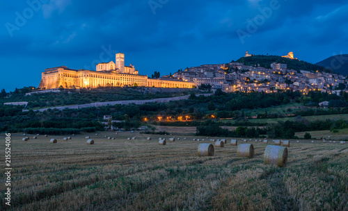 Panoramic view of Assisi at sunset, in the Province of Perugia, in the Umbria region of Italy. photo