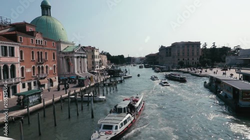 View in Venice from the bridge with sailing boat. photo