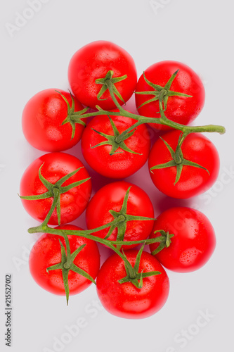 Bunch of fragrant tomato on white background. Top view. Isolated background. © DenisProduction.com