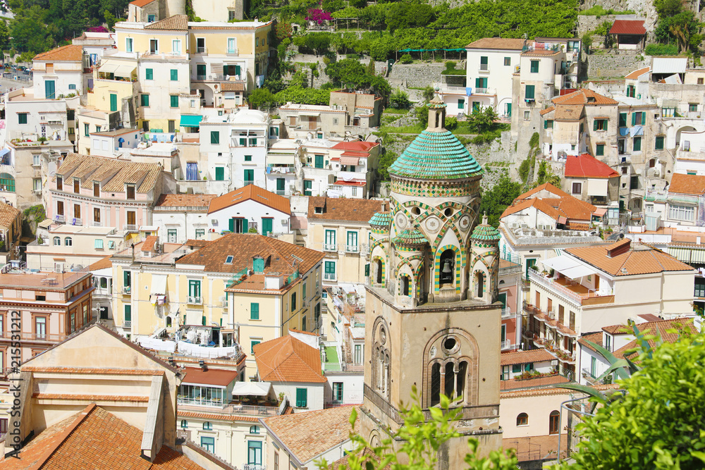 Stunning view of Amalfi town from above with the high ancient bell tower church, Amalfi Coast, Italy

