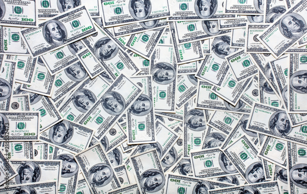 top view of one hundred dollars notes as textured background top view of one hundred dollars notes as textured background
