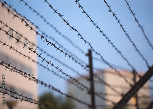 Barbed wire near private property