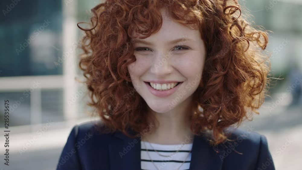 portrait of young red head business woman laughing happy intern campus portrait of young red head business woman laughing happy intern campus