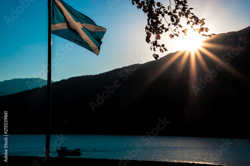 Sunset on a summer day by Loch Long. Arrochar village, Argyll and Bute, Scotland, UK. photo