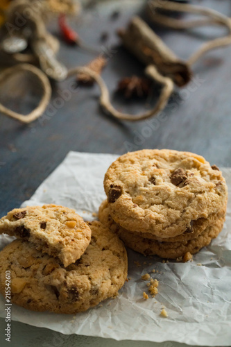 Biten biscuit cookie with almond on the table