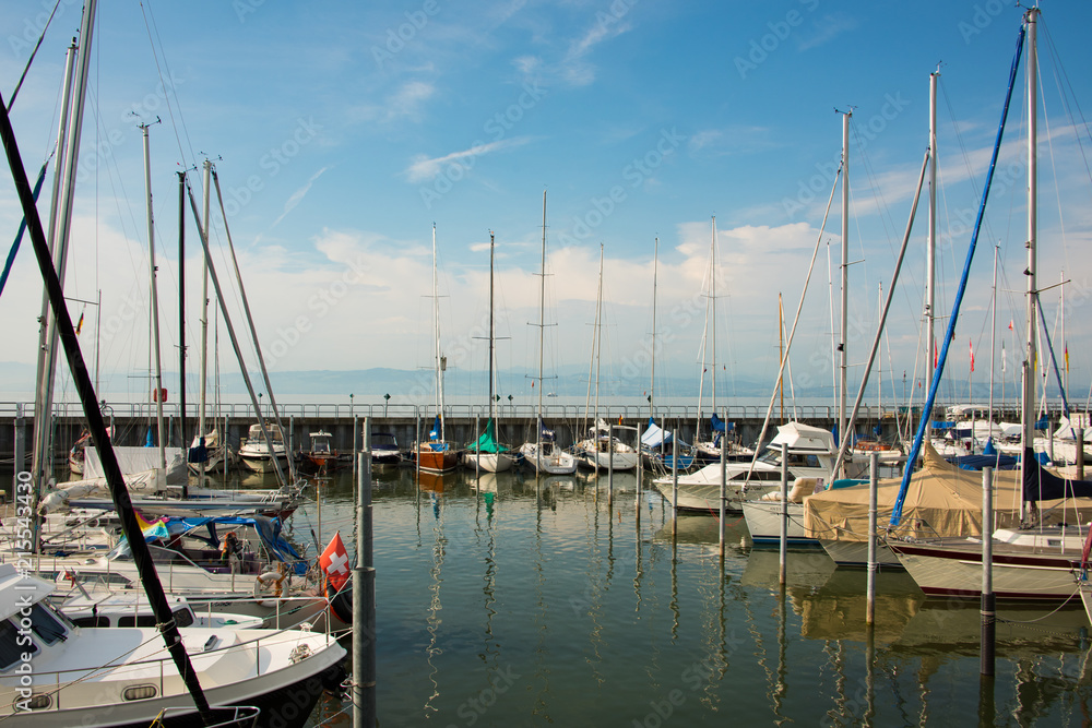 The marina of Friedrichshafen at Lake Constance in front of a bright blue sky
