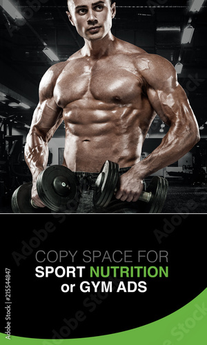 Fitness man warming up in gym. Strong muscular bodybuilder athlete. Bodybuilding and sport concept. Copy space for sport nutrition or gym banner and ads.
