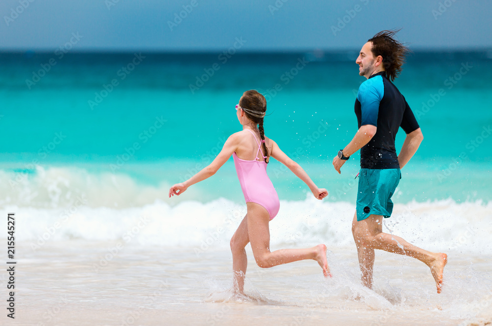 Father and daughter at beach