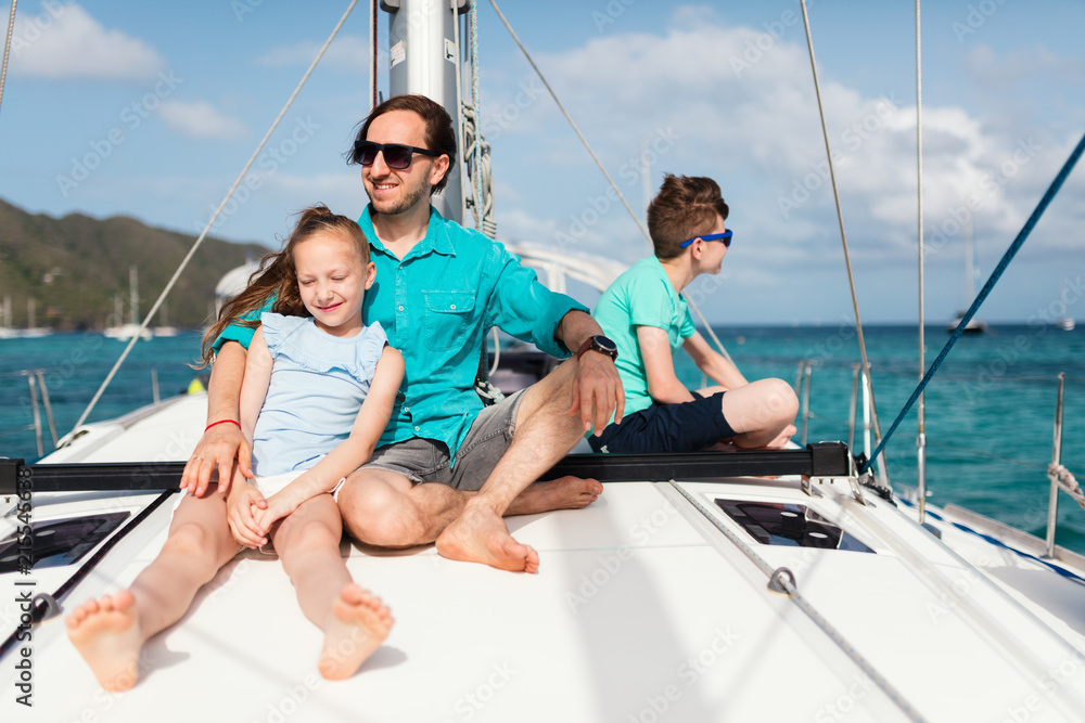 Family on board of sailing yacht Family on board of sailing yacht
