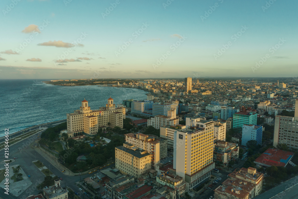 great aerial view of the city with buildings and beach from a drone