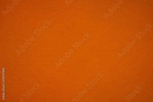 Dark orange paper texture and background