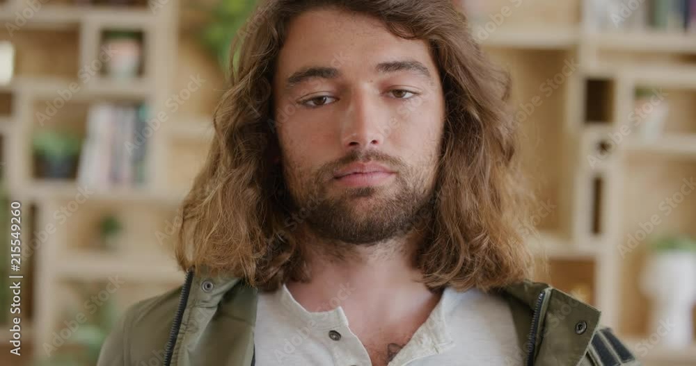 close up portrait of relaxed young man student looking confident with long hair real people series close up portrait of relaxed young man student looking confident with long hair real people series