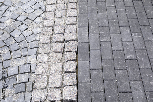 Different kind of pavement cobblestone on the street