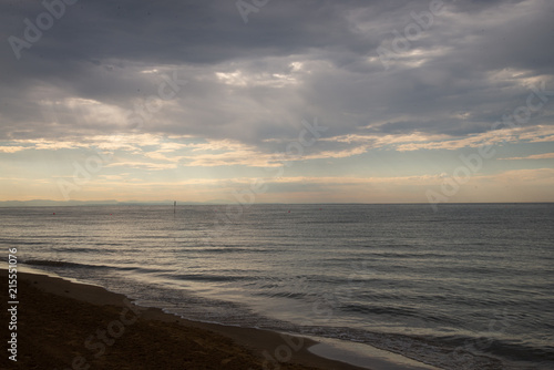 waves of the sea rough sandy and filthy dark brown color  in Bibione  Veneto  Italy