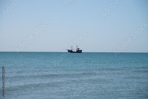 Old pirates vessel on the sea horizon