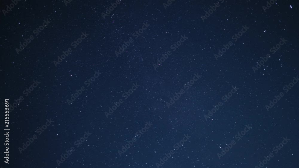 Timelapse of beautiful night sky with stars moving slowly, background in 4K UHD
