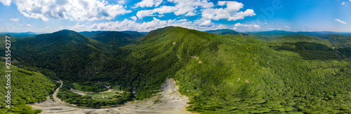 Aerial landscape of the Caucasus Mountains, forests, river. Panoramic photo 360 degrees.