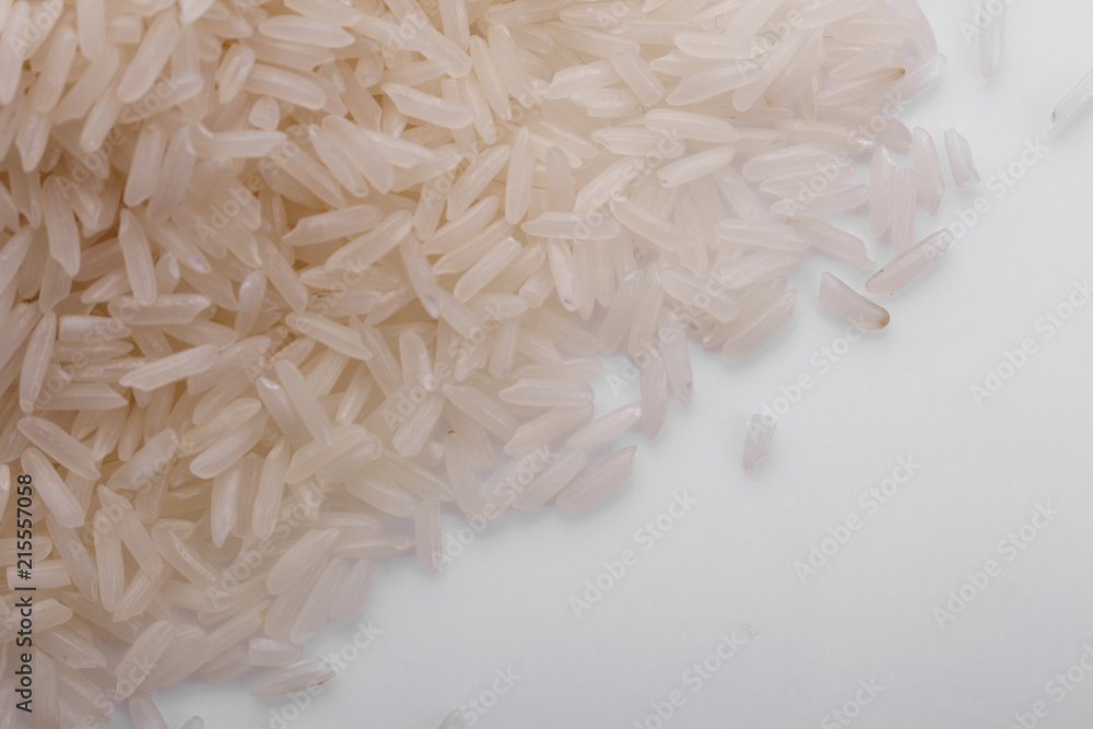 Jasmine rice on a white acrylic background Jasmine rice on a white acrylic background