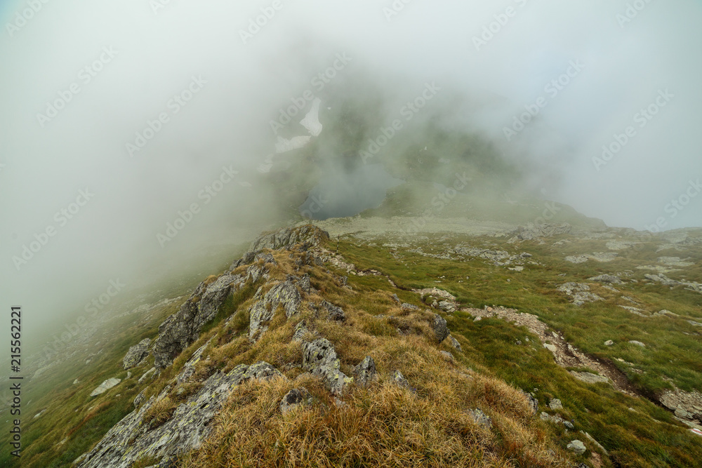 Misty mountains and hiking trail