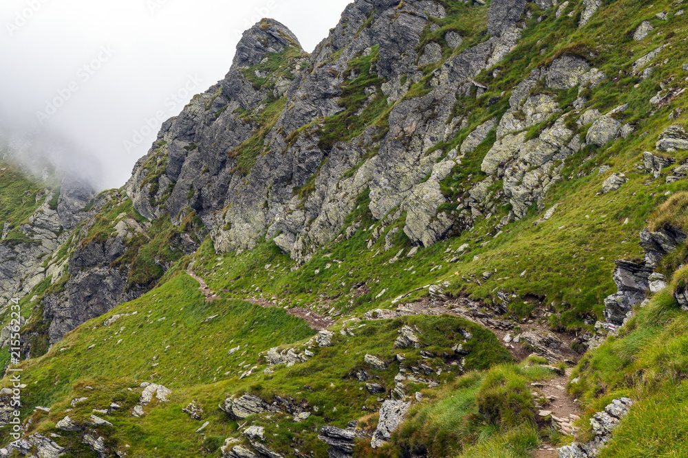 Misty mountains and hiking trail