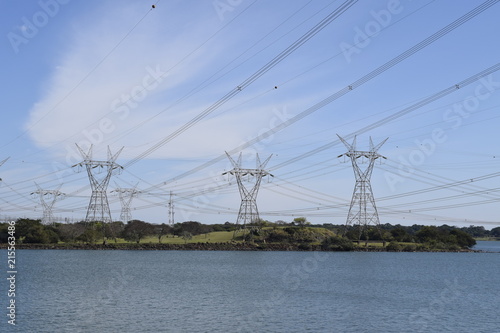 Torre de distribuição elétrica na grande represa da Usina de Itaipu. Lagoa artificial photo